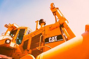 Da Mineração Pesada aos Algoritmos: Como a Caterpillar Usa Décadas de Automação para Liderar na Inteligência Artificial